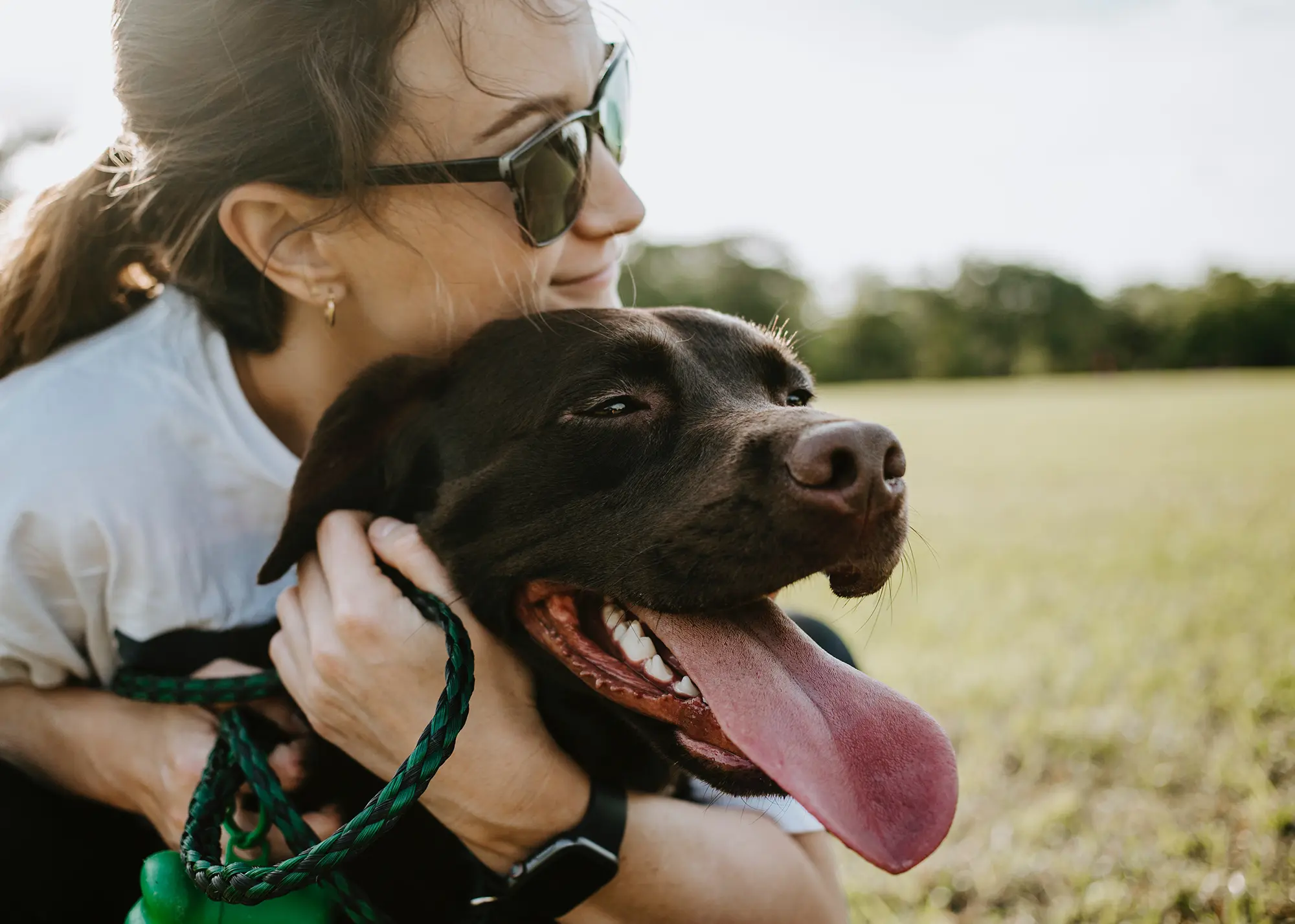 City Center Pet Clinic Practice Manager Samantha Simmons with her Labrador retriever